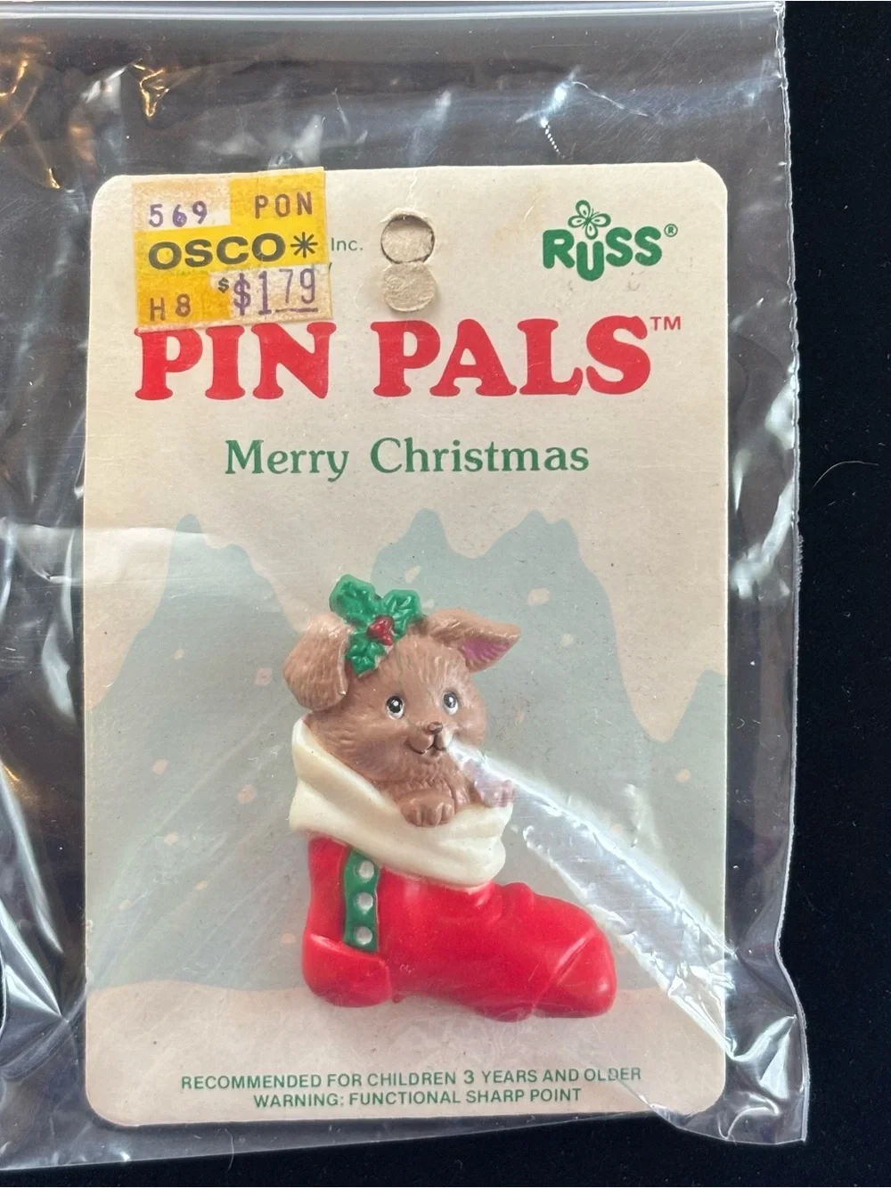 Russ Brown Puppy in Red Christmas Stocking Pin with Green Holly